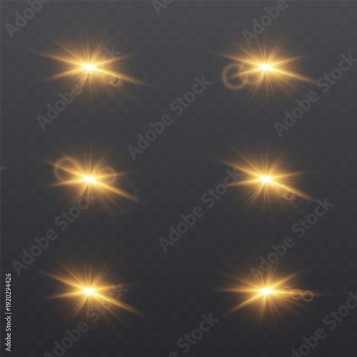 Set of golden lens flare light effects isolated on transparent background