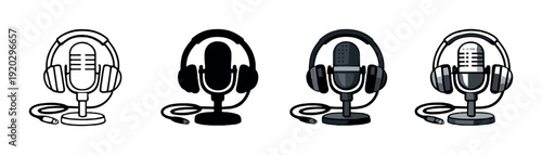 Four microphones with headphones arranged on gray gradient background