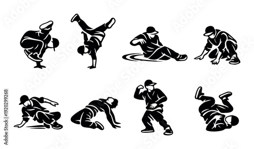 Breakdancers performing dynamic moves on gray background