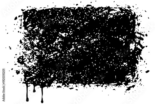 Black paint splatter on white background with drips and scattered spots during art creation process at an indoor studio