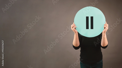 Woman holding pause sign, take a break, mental exhaustion by stress, menopause concept, hormone replacement therapy, self care lifestyle