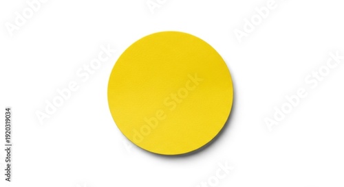 Vibrant yellow circle with subtle shadow on a clean white background. Simple and minimalist design, perfect for abstract concepts.