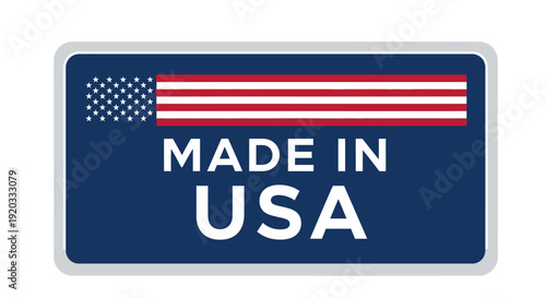 A rectangular label with the text MADE IN USA and American flag emblem on a dark blue background viewed from directly above