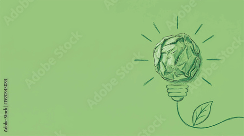 eco friendly green light bulb with leaf on green background