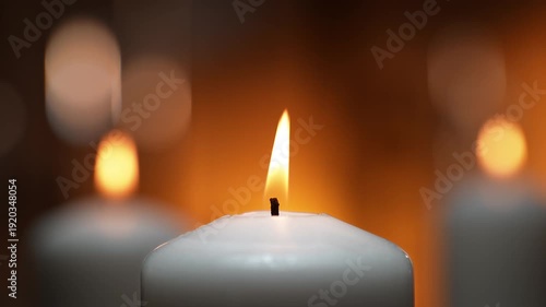 Flames Of White Ceremonial Candles Dancing In A Tranquil Spa Atmosphere in Slow Motion