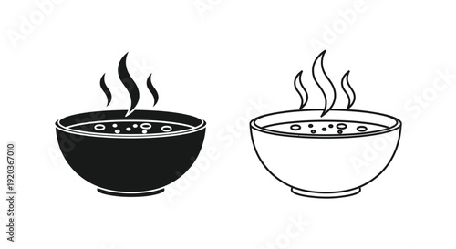Two steaming bowls of soup one dark and one light