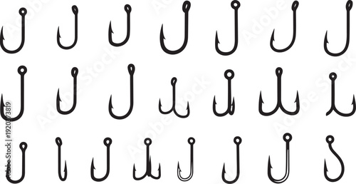 Collection of metal fishing hooks on white background