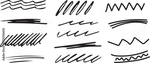 Collection of expressive hand drawn scribbles and lines in black ink on white background for artistic and design purposes