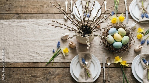 Wallpaper Mural Easter table setting with eggs and flowers on a rustic wooden table viewed from above Torontodigital.ca