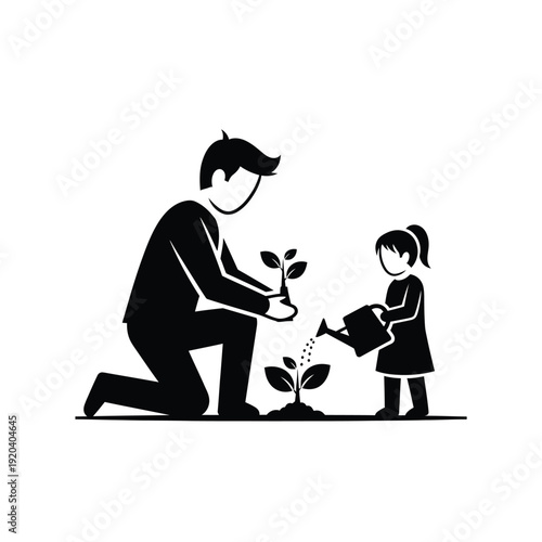 Father and Daughter Planting a Seedling Together