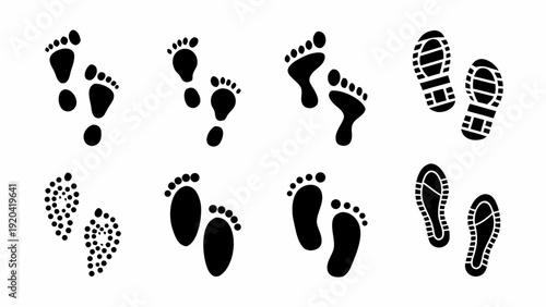 Collection of diverse footprint silhouettes in black and white design
