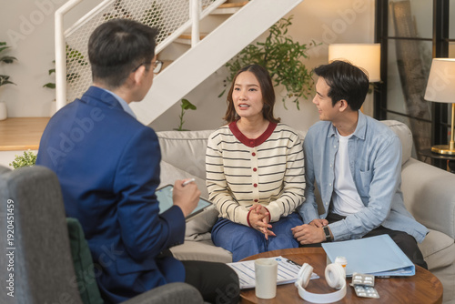 couples therapy session, a marriage counselor consults with a young couple for family therapy, offering relationship counseling, marriage help, family support, anxiety therapy, depression support