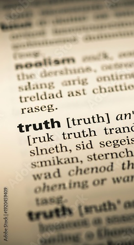 Close-up of the word truth in a dictionary, concept of honesty.