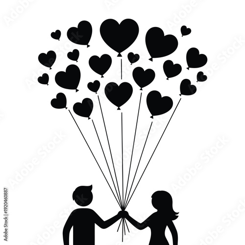 Silhouette of loving couple holding heart balloons