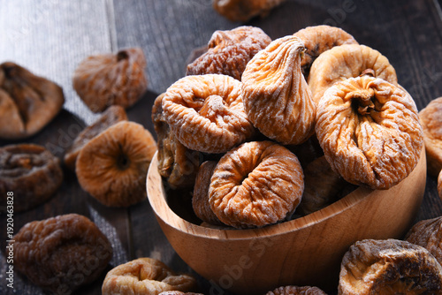 Wallpaper Mural Composition with bowl of dried figs on wooden table Torontodigital.ca