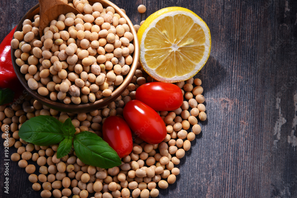 Obraz premium Composition with bowl of soya beans on wooden table