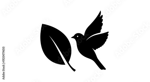 Black Silhouette Hummingbird Flying Near Leaf.