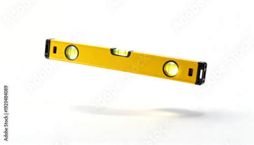Yellow spirit level tool floating in air on white background  