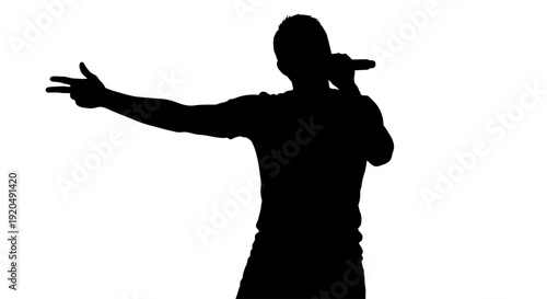 Silhouette of a Singer: A dynamic silhouette of a singer with microphone, expressing through music, set against a plain backdrop, capturing the passion and artistry of live performance.