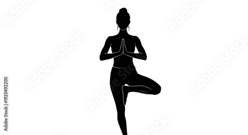 Serene Yoga Silhouette: A silhouette captures a yoga practitioner in a balancing pose, merging the tranquility of nature with the strength of the human spirit.
