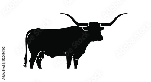 A striking black silhouette depicts a longhorn bull standing in profile showcasing its iconic horns silhouette high quality