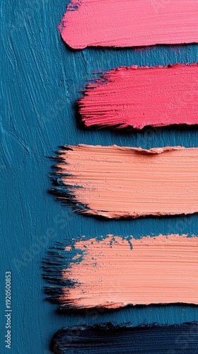 Layered Pastel Brush Strokes Textured Background in Various Shades of Pink and Coral with a Dark Blue Base and Subtle Glitter Overlay for Cosmetic Applications