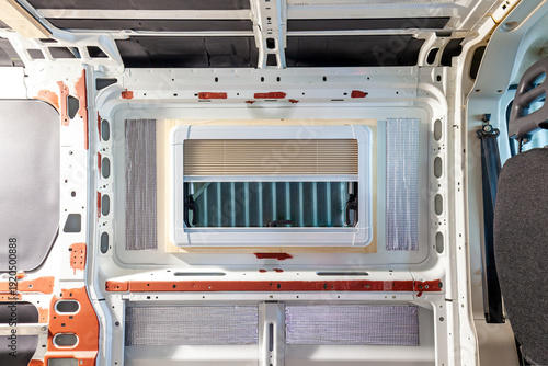 Wallpaper Mural Camper van conversion. new window. Camper van conversion. installing a side window. Inside of a camper van.  Torontodigital.ca