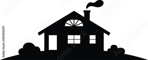 Simple black silhouette of a cozy house with a chimney emitting smoke surrounded by greenery