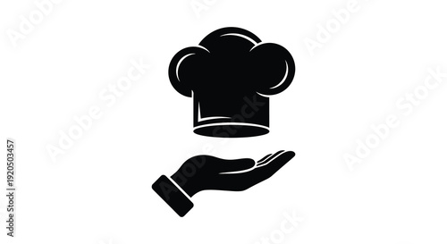A black silhouette of a chef s hat presented on an open hand symbolizing culinary expertise silhouette high quality professional detailed modern