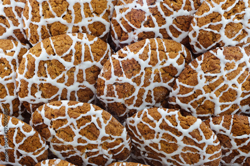 Classic homemade oatmeal cookies decorated with white sugar icing