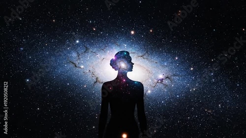 Silhouette of a human head filled with a vibrant galaxy and stars.