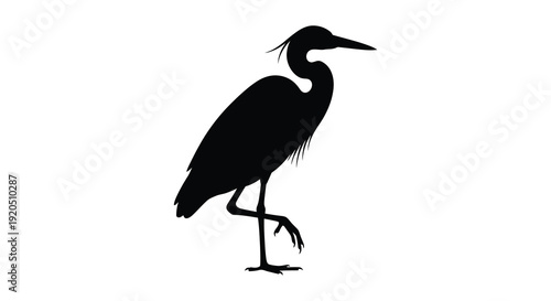 A striking black silhouette of a long necked heron standing elegantly showcasing its distinct form silhouette high quality professional detailed