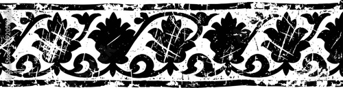 Vintage distressed floral border with oak leaves and swirling vine design in black and white