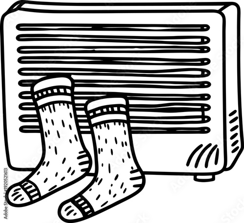 Warm socks drying in front of heater radiator cozy winter accessory care and home comfort concept