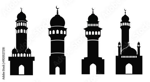 Four islamic mosque minarets presented as a striking black silhouette