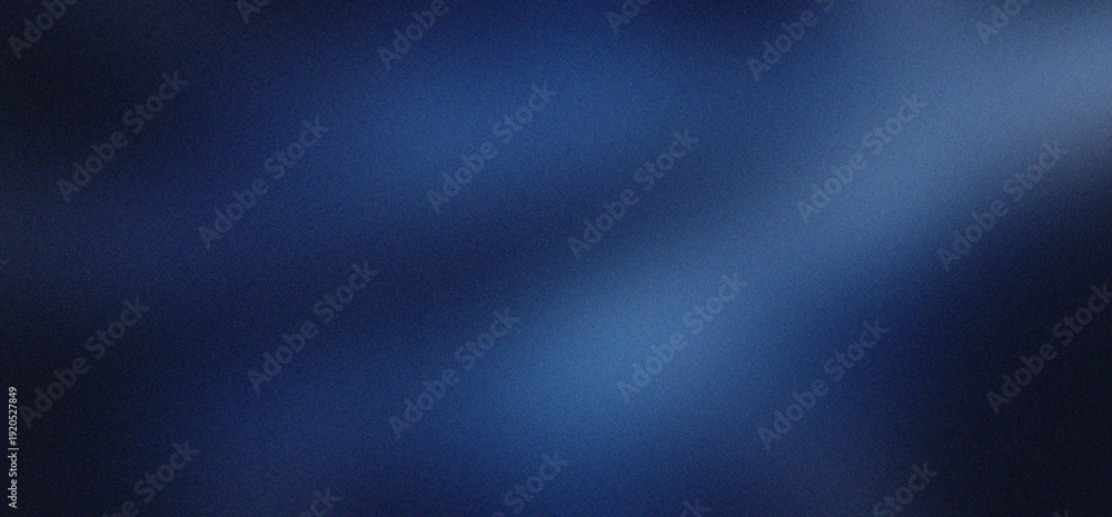Fototapeta premium Abstract dark blue gradient background with soft light leaks and subtle blurred texture, creating a smooth and atmospheric visual effect.