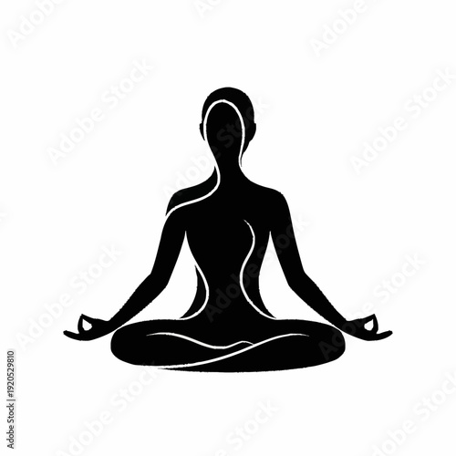 Silhouette of a person meditating in a lotus pose.