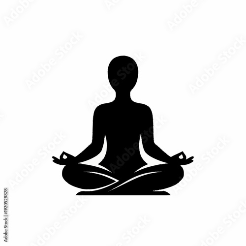 Silhouette of a person meditating in a lotus position.