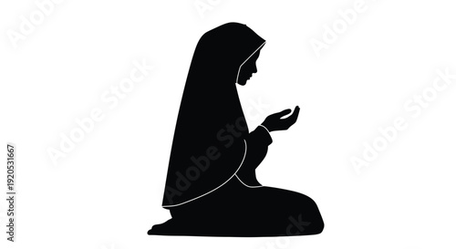 Praying woman in traditional islamic clothing a striking silhouette