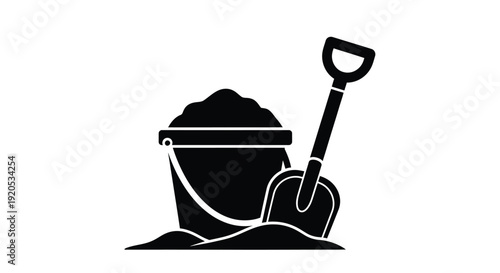 Black silhouette of a bucket shovel and sandcastle creation silhouette
