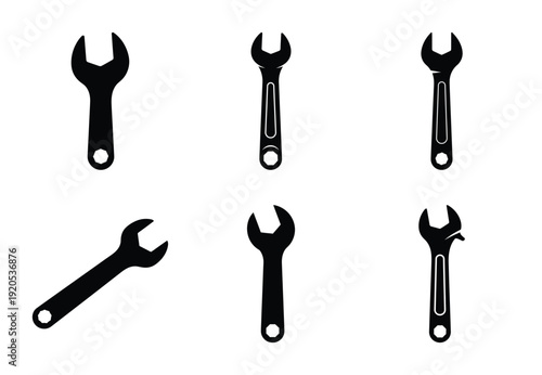 A set of  constriction tools and open end wrench icons