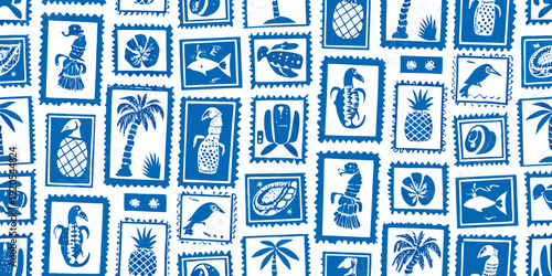Blue and white repeating pattern of vintage postage stamps with tropical motifs