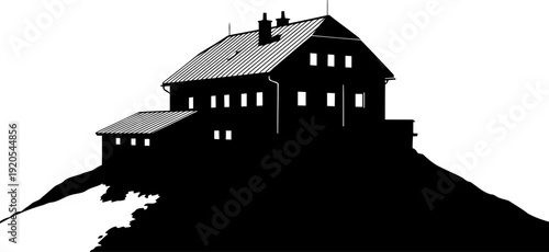 Alpine mountain lodge silhouette situated on a high peak