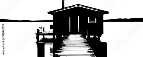 Lakeside sauna cabin silhouette at the end of a pier