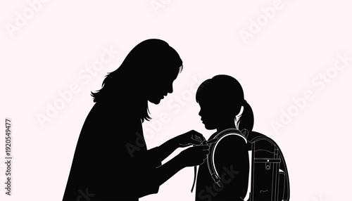 A mother helping her child prepare for school