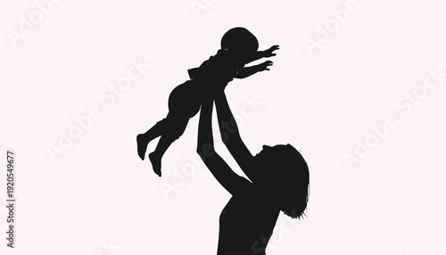 A mother playfully lifts her baby up in the air