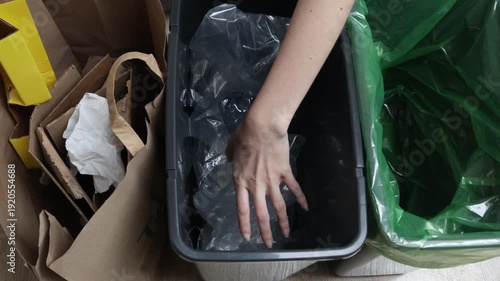 Woman Sorting Waste for Recycling