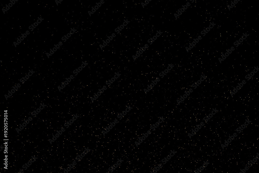 Fototapeta premium Abstract image of twinkling stars against a deep black background perfect for space or fantasy themes
