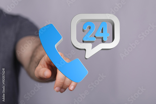 A hand touches a blue phone...