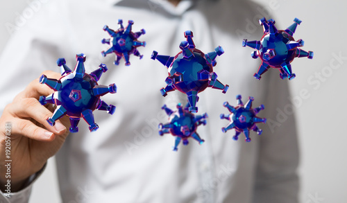 Принти на полотні An artistic visualization of viruses manipulated by a human hand, representing t